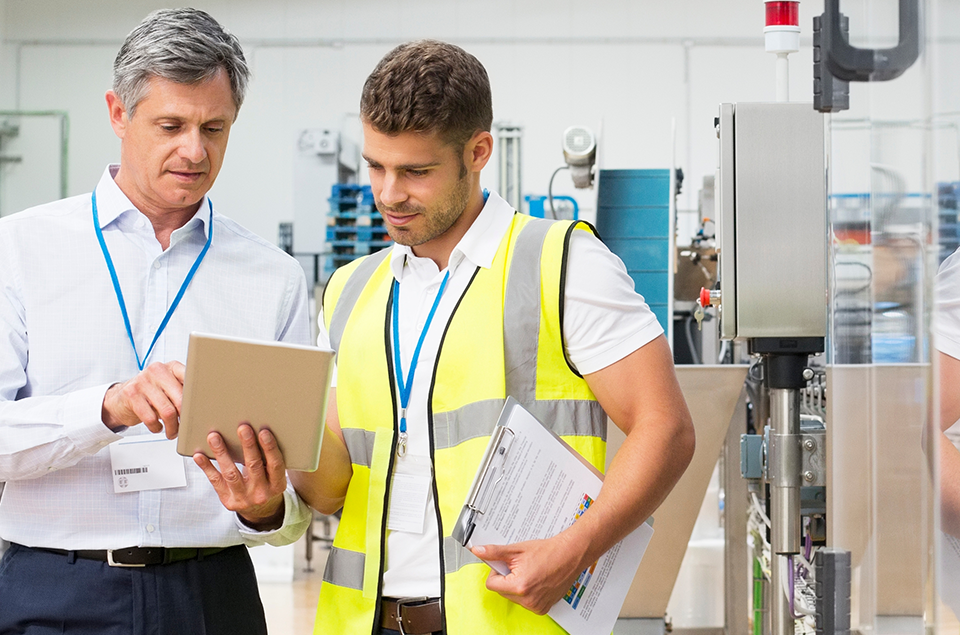2 Manufacturing Engineers Discussing Grinding Wheel Balancing